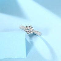 1ct moissanite wedding ring detail shot - stone setting and band edge, 925 sterling silver