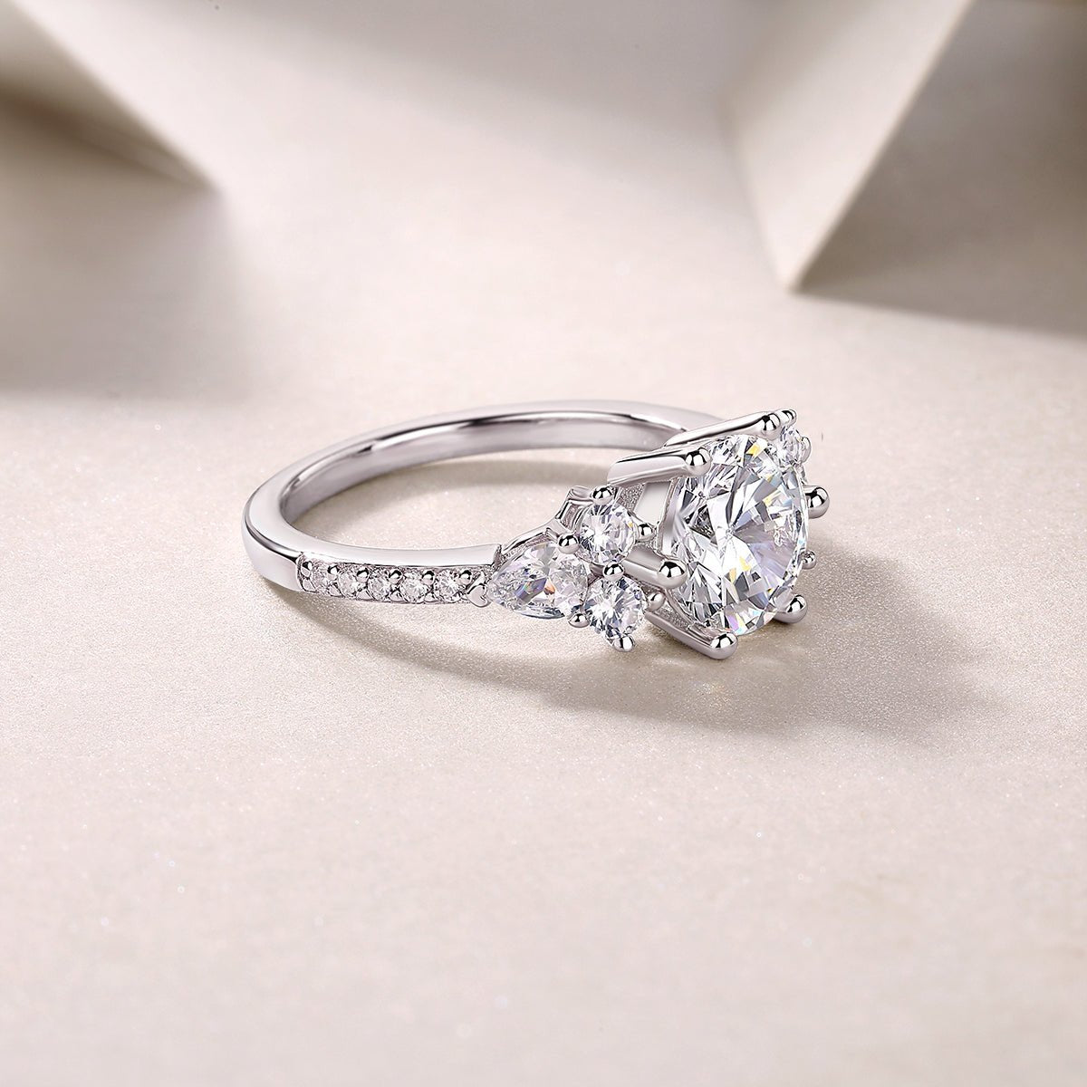 Close-up of 2ct moissanite stone in ring - brilliant cut sparkle, 925 sterling silver band