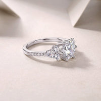 Close-up of 2ct moissanite stone in ring - brilliant cut sparkle, 925 sterling silver band