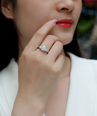 Three-stone ring side profile - showing all three stones and band, 925 sterling silver