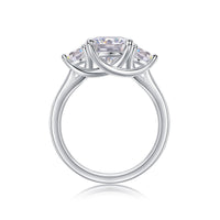 Three-stone ring on hand/wrist - lifestyle shot showing three-stone effect, 925 sterling silver