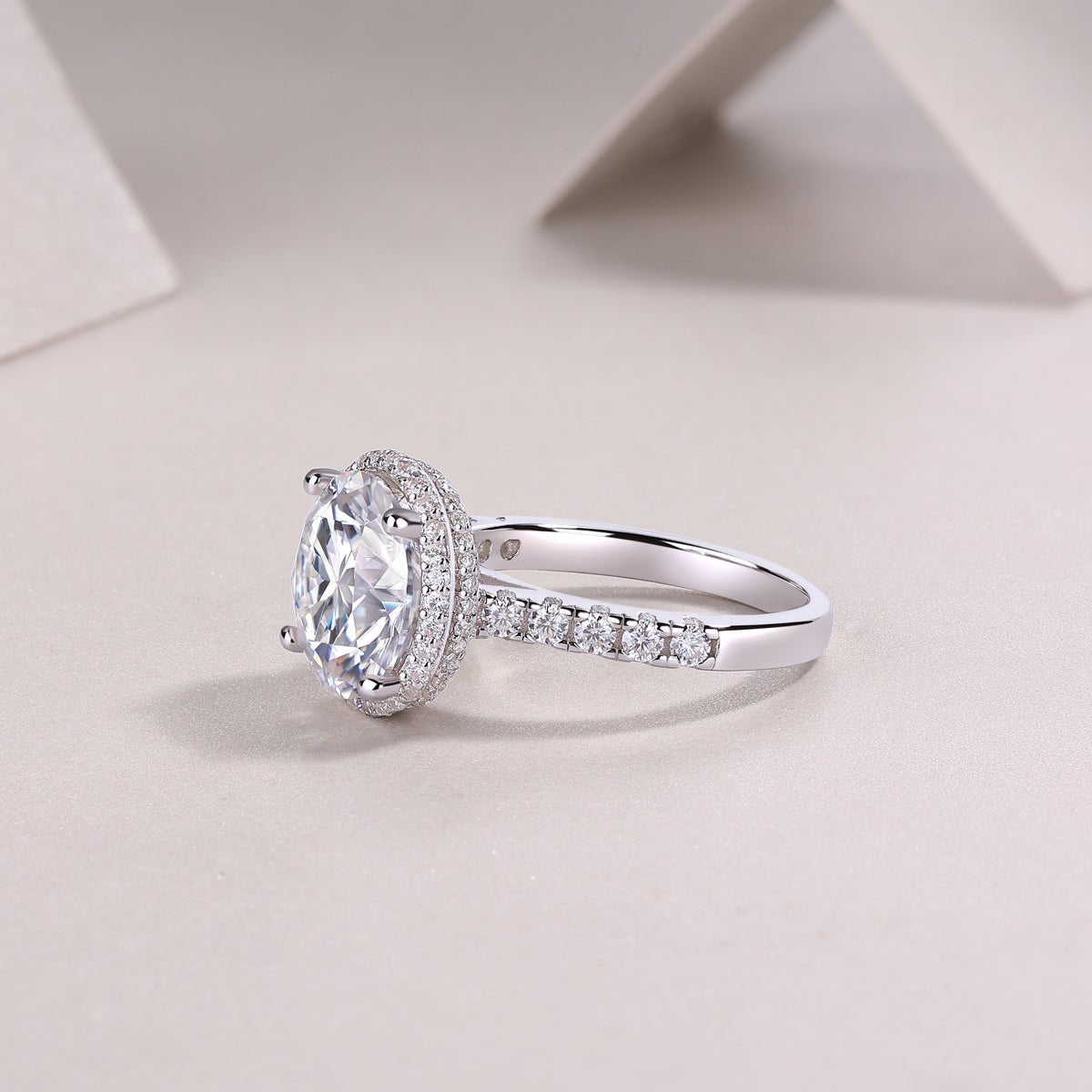 5ct moissanite halo ring on white background - product beauty shot, platinum-plated 925 sterling silver