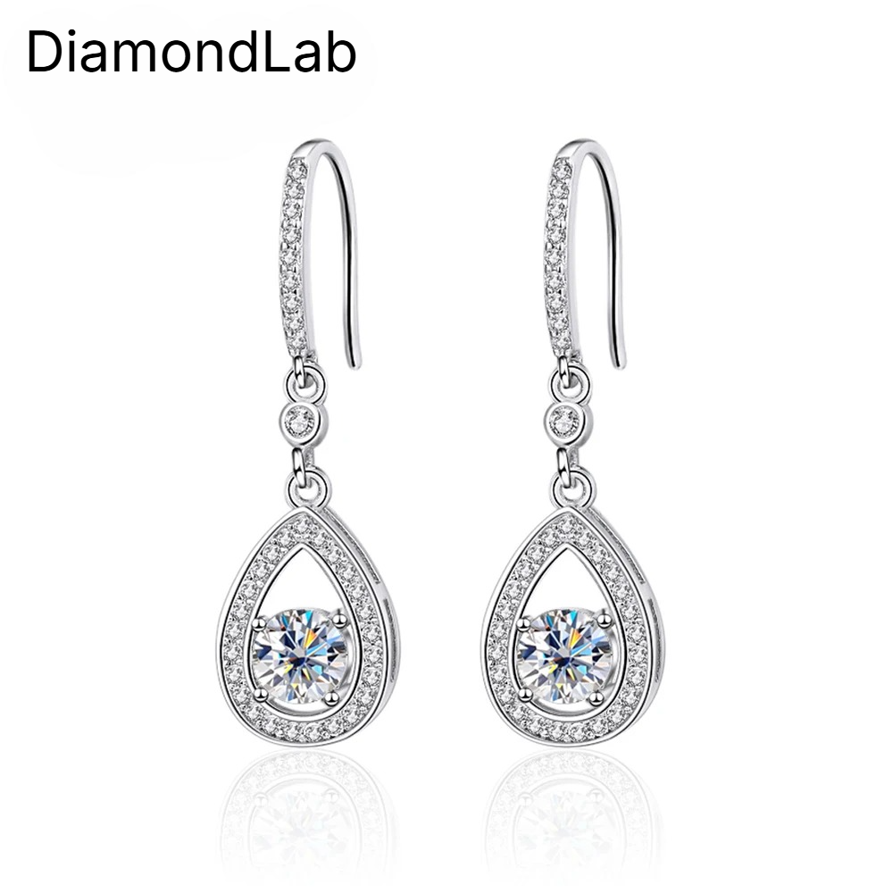 Timeless drop design. Sparkling pear-cut moissanite in a graceful halo setting for effortless elegance. - Diamond-Lab