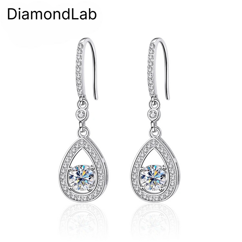 Timeless drop design. Sparkling pear-cut moissanite in a graceful halo setting for effortless elegance. - Diamond-Lab