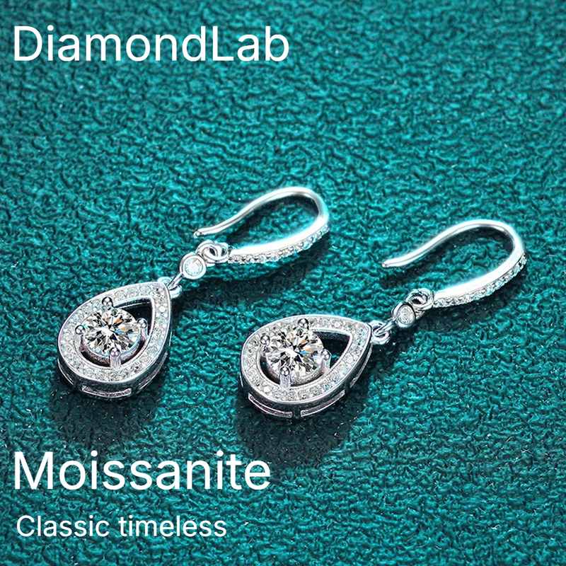 Timeless drop design. Sparkling pear-cut moissanite in a graceful halo setting for effortless elegance. - Diamond-Lab
