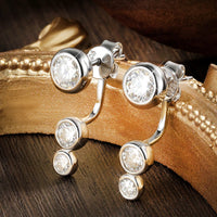 Modern and elegant, these triple Moissanite drops add a sleek, sparkling twist to classic studs. - Diamond-Lab