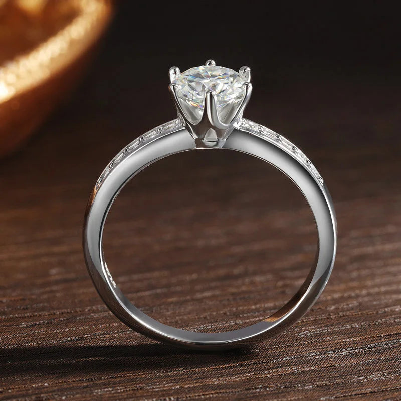 A stunning floral-inspired Moissanite ring with delicate side stones — romantic, radiant, and made to celebrate love. - Diamond-Lab