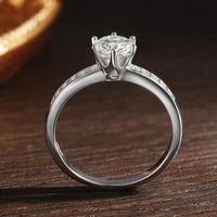 A stunning floral-inspired Moissanite ring with delicate side stones — romantic, radiant, and made to celebrate love. - Diamond-Lab