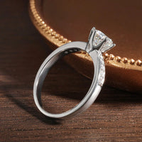 A stunning floral-inspired Moissanite ring with delicate side stones — romantic, radiant, and made to celebrate love. - Diamond-Lab