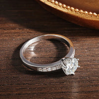 A stunning floral-inspired Moissanite ring with delicate side stones — romantic, radiant, and made to celebrate love. - Diamond-Lab