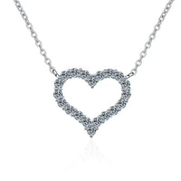 Sparkling heart pendant necklace for women, featuring moissanite stones on sterling silver, perfect for gifts.
