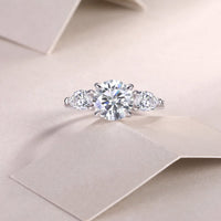 Three-stone engagement ring side profile - showing all three stones and band, S925 sterling silver