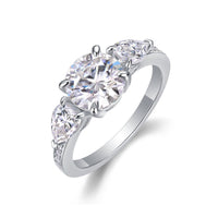 Close-up of three-stone ring center stone - brilliant cut sparkle, S925 sterling silver